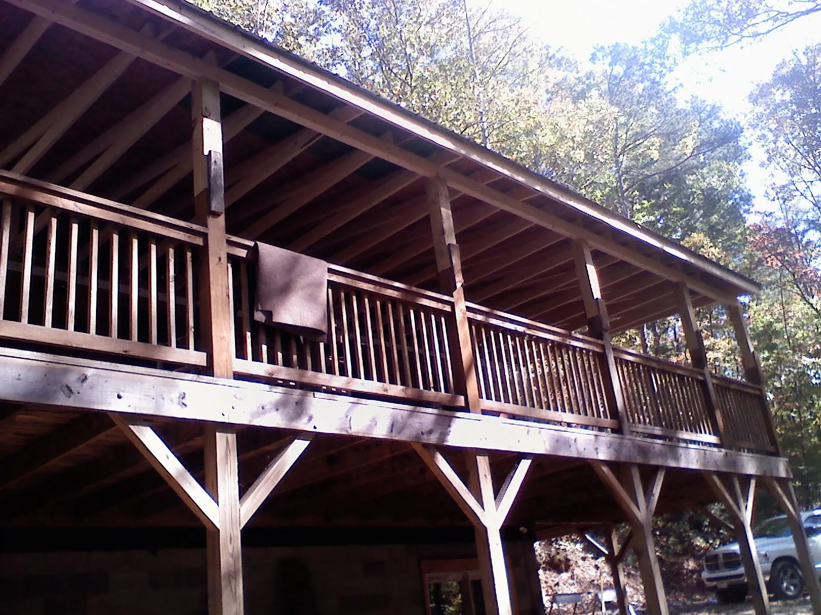 Timber framing under a new elevated porch and deck — Roof Leak Repair in Boca Raton by Roofing Brothers